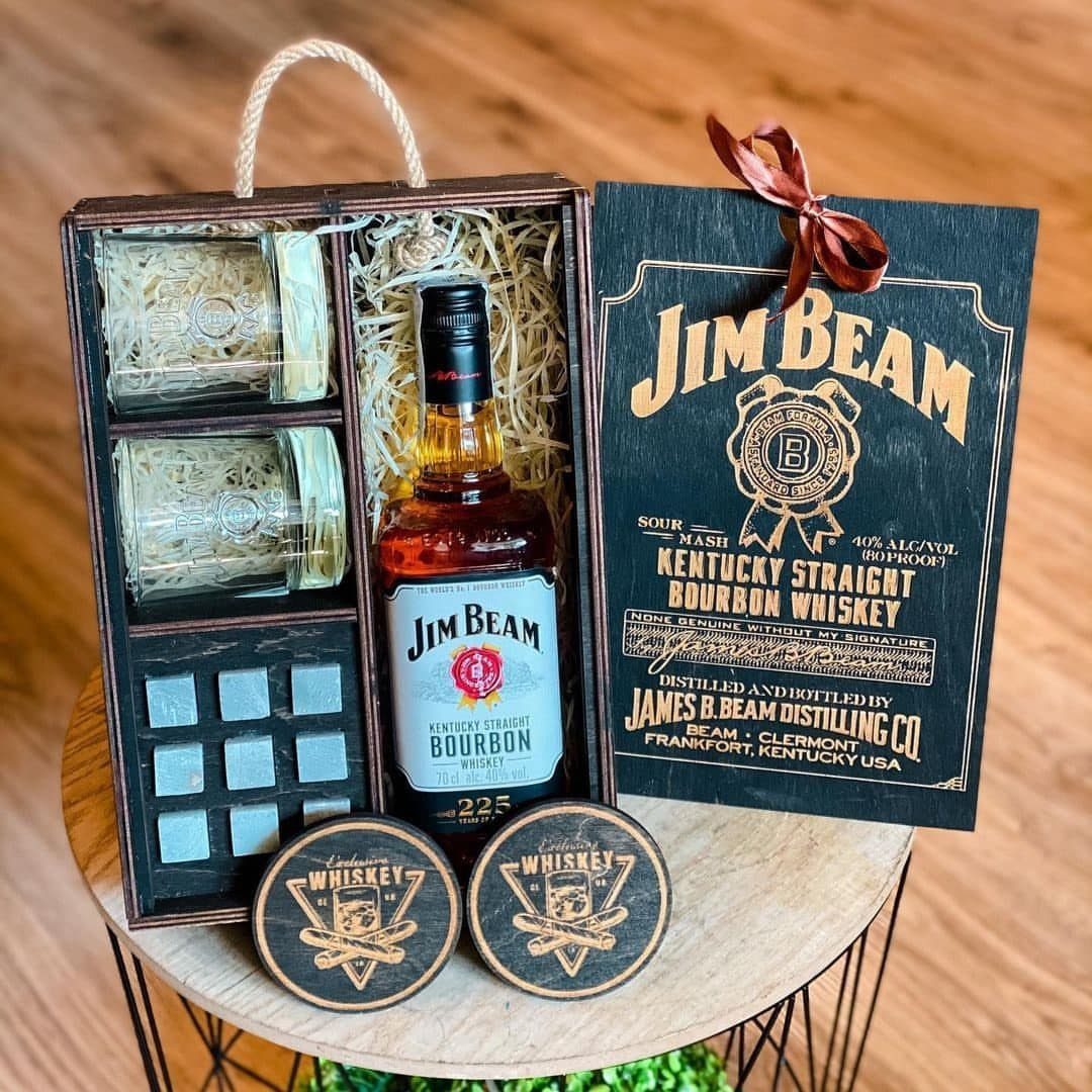 Jim Beam bourbon bottle in a wooden gift box with coasters and jars